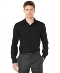 A modern grid pattern plaid gives this Perry Ellis shirt its handsome style. A modern grid pattern plaid gives this Perry Ellis shirt its handsome style.