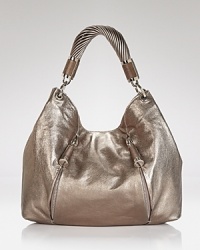 A shining example of practical style, this luxurious hobo bag from Michael Kors comes crafted in leather with a perfectly slouchy (yet sophisticated) shape. A shining example of practical style, this luxurious hobo bag from Michael Kors comes crafted in leather with a perfectly slouchy (yet sophisticated) shape.
