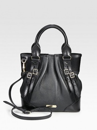 Luxurious smooth and pebbled leather with pleated details and elegant buckled strap accents.Double top handles, 5½ dropDetachable adjustable shoulder strap, 21-24 dropMagnetic snap closureOne inside zip pocketTwo inside open pocketsCheck printed linen lining11W X 11½H X 4½DMade in Italy Luxurious smooth and pebbled leather with pleated details and elegant buckled strap accents.Double top handles, 5½ dropDetachable adjustable shoulder strap, 21-24 dropMagnetic snap closureOne inside zip pocketTwo inside open pocketsCheck printed linen lining11W X 11½H X 4½DMade in Italy