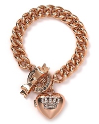 Juicy Couture breaks hearts with this rose-gold link bracelet. With a pretty pendant and romantic tone, it's a wholly on-trend token of affection. Juicy Couture breaks hearts with this rose-gold link bracelet. With a pretty pendant and romantic tone, it's a wholly on-trend token of affection.