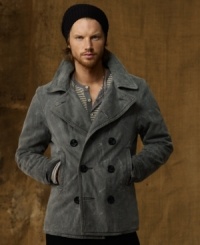 The classic military workwear silhouette is reincarnated in distressed, faded denim to create a vintage-inspired pea coat. The classic military workwear silhouette is reincarnated in distressed, faded denim to create a vintage-inspired pea coat.