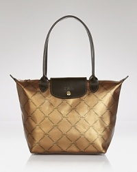 The epitome of laid back luxe: Longchamp's signature shoulder bag is a shining example of have-now and wear-forever style. The epitome of laid back luxe: Longchamp's signature shoulder bag is a shining example of have-now and wear-forever style.