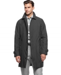 Battle the elements. This raincoat from Calvin Klein lets you face any day with sleek, streamlined style. Battle the elements. This raincoat from Calvin Klein lets you face any day with sleek, streamlined style.