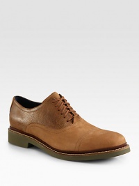 Your one-step shortcut to looking sharp: our streamlined oxford with decorative stitching on its cap toe.Leather upperLeather liningPadded insoleRubber soleImported Your one-step shortcut to looking sharp: our streamlined oxford with decorative stitching on its cap toe.Leather upperLeather liningPadded insoleRubber soleImported