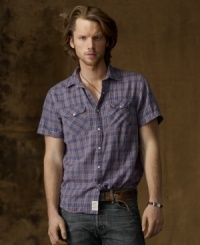 Channeling homespun style in softly textured woven cotton, a short-sleeved Western shirt in rugged plaid gives off an effortless, laid-back vibe. Channeling homespun style in softly textured woven cotton, a short-sleeved Western shirt in rugged plaid gives off an effortless, laid-back vibe.