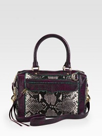 Colorblocking adds an unbelievably chic touch to this embossed-leather satchel with convenient inside and outside pockets.Double top handles, 7½ dropDetachable shoulder strap, 20 dropTop zip closureOne outside zip pocketOne inside zip pocketTwo inside open pocketsCotton lining12½W X 8H X 6½DImported