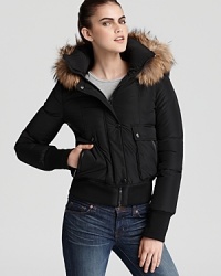 Mackage's bomber jacket boast cool girl style. A plush down fill ensures you keep cozy and fur ruff adds luxe to your look. Mackage's bomber jacket boast cool girl style. A plush down fill ensures you keep cozy and fur ruff adds luxe to your look.