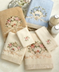 Add an elegant dash of English grace to your powder room with Avanti Rosefan wash towels. Embroidered with a delicate flower design and finished with a textured jacquard border. Add an elegant dash of English grace to your powder room with Avanti Rosefan wash towels. Embroidered with a delicate flower design and finished with a textured jacquard border.