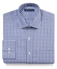 Classic checkers add instant appeal to any outfit with this Tommy Hilfiger dress shirt. Classic checkers add instant appeal to any outfit with this Tommy Hilfiger dress shirt.