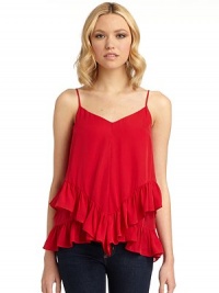 THE LOOKPullover styleDouble v-neckSleevelessTiered ruffled hemTHE FITAbout 26 from shoulder to hemTHE MATERIALSilkCARE & ORIGINDry cleanImportedModel shown is 5'10 (177cm) wearing US size Small. THE LOOKPullover styleDouble v-neckSleevelessTiered ruffled hemTHE FITAbout 26 from shoulder to hemTHE MATERIALSilkCARE & ORIGINDry cleanImportedModel shown is 5'10 (177cm) wearing US size Small.