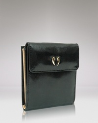 Give into practical accessorizing with this patent Italian leather wallet from Tusk. It's profile is pocket perfect, while a glossy exterior lends polish. Give into practical accessorizing with this patent Italian leather wallet from Tusk. It's profile is pocket perfect, while a glossy exterior lends polish.