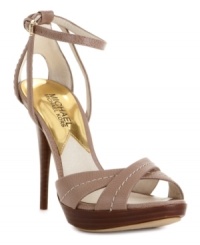 Luxurious fabric and subtle stitching on MICHAEL by Michael Kors' Eleni platform sandals will make these your go-to sexy shoe. Luxurious fabric and subtle stitching on MICHAEL by Michael Kors' Eleni platform sandals will make these your go-to sexy shoe.
