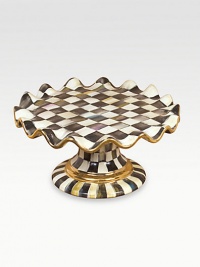 A beautifully handcrafted ceramic stand in a checkerboard juxtaposition of ivory and onyx with gold luster. The perfect accompaniment to a cake, pie or quiche is fired three times for added strength to last a lifetime. Fluted edges Hand-painted and -glazed 6½H X 12 diam. Hand wash Made in USA A beautifully handcrafted ceramic stand in a checkerboard juxtaposition of ivory and onyx with gold luster. The perfect accompaniment to a cake, pie or quiche is fired three times for added strength to last a lifetime. Fluted edges Hand-painted and -glazed 6½H X 12 diam. Hand wash Made in USA