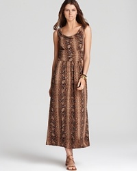 A snakeskin print lends exotic dimension to this VINCE CAMUTO maxi dress. Finish with strappy leather sandals to really work the tribal trend. A snakeskin print lends exotic dimension to this VINCE CAMUTO maxi dress. Finish with strappy leather sandals to really work the tribal trend.