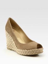 Alarmingly soft nubuck leather upper encompasses a brilliantly braided espadrille wedge and platform. Braided hemp wedge, 4½ (115mm)Braided hemp platform, 1 (25mm)Compares to a 3½ heel (90mm)Leather upperLeather liningRubber solePadded insoleImportedOUR FIT MODEL RECOMMENDS ordering one half size up as this style runs small. Alarmingly soft nubuck leather upper encompasses a brilliantly braided espadrille wedge and platform. Braided hemp wedge, 4½ (115mm)Braided hemp platform, 1 (25mm)Compares to a 3½ heel (90mm)Leather upperLeather liningRubber solePadded insoleImportedOUR FIT MODEL RECOMMENDS ordering one half size up as this style runs small.