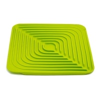Showcasing a bold, bright color and concentric design, Joseph Joseph's folding draining mat is designed to channel water efficiently and quickly while protecting glasses and dishware. The folding design makes it easy to remove excess water. Showcasing a bold, bright color and concentric design, Joseph Joseph's folding draining mat is designed to channel water efficiently and quickly while protecting glasses and dishware. The folding design makes it easy to remove excess water.