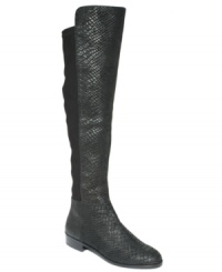 Stylishly serpentine. The Bromley flat boots by MICHAEL Michael Kors finish a classic tall boot silhouette with python embossing. Stylishly serpentine. The Bromley flat boots by MICHAEL Michael Kors finish a classic tall boot silhouette with python embossing.