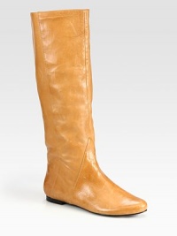 A clean design of supple leather with seam detailing. Shaft, 14¾Leg circumference, 13½Leather upperPull-on styleLeather lining and solePadded insoleImported A clean design of supple leather with seam detailing. Shaft, 14¾Leg circumference, 13½Leather upperPull-on styleLeather lining and solePadded insoleImported