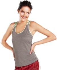 Made from sporty Dri-FIT fabric that wicks moisture to keep you cool, Nike's tank top is a workout essential! Made from sporty Dri-FIT fabric that wicks moisture to keep you cool, Nike's tank top is a workout essential!