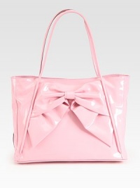 Patent leather carryall finished with a chic front bow.Double top handles, 10 dropTop snap closureProtective metal feetOne inside zip pocketTwo inside open pocketsCotton lining15W X 11H X 7DMade in Italy Patent leather carryall finished with a chic front bow.Double top handles, 10 dropTop snap closureProtective metal feetOne inside zip pocketTwo inside open pocketsCotton lining15W X 11H X 7DMade in Italy