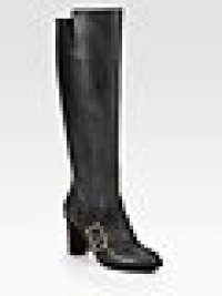 Equestrian-inspired sky-high design of supple leather, topped with a perforated buckle strap and side elastic gores. Stacked heel, 3 (75mm)Shaft, 15¼Leg circumference, 14Leather upperPull-on style with elastic goresLeather lining and soleMade in ItalyThis style runs small. We recommend ordering one half size up for a standard fit. Equestrian-inspired sky-high design of supple leather, topped with a perforated buckle strap and side elastic gores. Stacked heel, 3 (75mm)Shaft, 15¼Leg circumference, 14Leather upperPull-on style with elastic goresLeather lining and soleMade in ItalyThis style runs small. We recommend ordering one half size up for a standard fit.