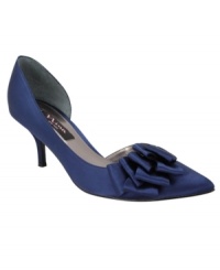 Dress to the nines. Luxe satin wraps around the pointed-toe silhouette of the Brynn evening pumps by Nina. A tonal stacked ribbon embellishment lends opulent texture. Dress to the nines. Luxe satin wraps around the pointed-toe silhouette of the Brynn evening pumps by Nina. A tonal stacked ribbon embellishment lends opulent texture.