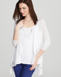 Crafted from a subtle, sheer white and accented with an on-trend dipped hem, this Eileen Fisher cardigan is the the perfect finishing touch for instant style. Crafted from a subtle, sheer white and accented with an on-trend dipped hem, this Eileen Fisher cardigan is the the perfect finishing touch for instant style.
