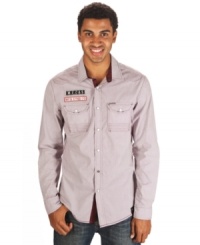 This Marc Ecko Cut & Sew button down has a cool gas patch and stylish snap closure sure to get your motor going. This Marc Ecko Cut & Sew button down has a cool gas patch and stylish snap closure sure to get your motor going.