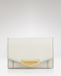 Get carded with this MARC BY MARC JACOBS case, which is styled in textured leather and features a simple snap closure.