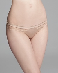 Create a stir with a sultry thong bra featuring lace panels at hips. Style #942109 Create a stir with a sultry thong bra featuring lace panels at hips. Style #942109