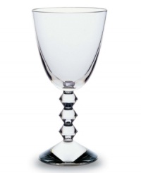 The Vega collection of wine glasses will make a unique and striking addition to your finely set table. Each piece features a neck lined with thick connecting diamond-shaped glass studs leading from the commanding sturdy base to the simple bulb, lending a look that has the timeless effect and appeal of glittering diamonds. The Vega collection of wine glasses will make a unique and striking addition to your finely set table. Each piece features a neck lined with thick connecting diamond-shaped glass studs leading from the commanding sturdy base to the simple bulb, lending a look that has the timeless effect and appeal of glittering diamonds.