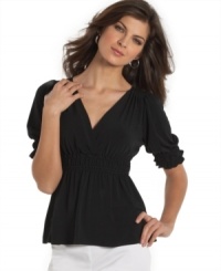 Fit to flatter, Studio M's smocked top is a definite must-have for year-round style. Fit to flatter, Studio M's smocked top is a definite must-have for year-round style.