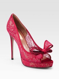 A beautiful bow defines this peep toe silhouette of feminine lace trimmed in satin, elevated with a sturdy platform. Self-covered heel, 5 (125mm)Covered platform, ¾ (20mm)Compares to a 4¼ heel (110mm)Lace upper with satin trimPeep toeLeather lining and solePadded insoleMade in ItalyOUR FIT MODEL RECOMMENDS ordering true size. A beautiful bow defines this peep toe silhouette of feminine lace trimmed in satin, elevated with a sturdy platform. Self-covered heel, 5 (125mm)Covered platform, ¾ (20mm)Compares to a 4¼ heel (110mm)Lace upper with satin trimPeep toeLeather lining and solePadded insoleMade in ItalyOUR FIT MODEL RECOMMENDS ordering true size.