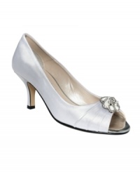 Caparros' Amelia evening sandals are peep-toe with a pretty rhinestone flower. For dressy looks that don't demand a ton of height. Caparros' Amelia evening sandals are peep-toe with a pretty rhinestone flower. For dressy looks that don't demand a ton of height.