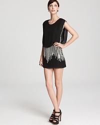 Get the party started in this short and sleek Parker dress. The eye-catching silver beading will make you stand out in style. Get the party started in this short and sleek Parker dress. The eye-catching silver beading will make you stand out in style.