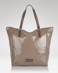 Electrify your accessories portfolio with MARC BY MARC JACOBS' tote. In a shocking pink hue, this bag lives to enliven a monochrome look. Electrify your accessories portfolio with MARC BY MARC JACOBS' tote. In a shocking pink hue, this bag lives to enliven a monochrome look.