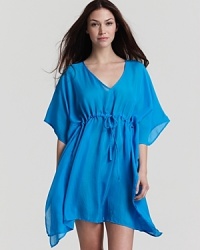 A vibrant and flowy caftan with a V-neckline and drawstring waist, a chic bedtime look from Midnight by Carole Hochman. A vibrant and flowy caftan with a V-neckline and drawstring waist, a chic bedtime look from Midnight by Carole Hochman.