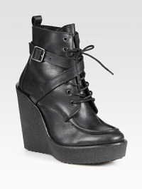 Adjustable, wrap-around buckle strap adds rocker charm to this lace-up leather ankle boot, while a rubber wedge and platform add the right amount of height. Rubber wedge, 5 (125mm)Rubber platform, 1 (25mm)Compares to a 4 heel (100mm)Leather upperLeather liningRubber solePadded insoleMade in Italy Adjustable, wrap-around buckle strap adds rocker charm to this lace-up leather ankle boot, while a rubber wedge and platform add the right amount of height. Rubber wedge, 5 (125mm)Rubber platform, 1 (25mm)Compares to a 4 heel (100mm)Leather upperLeather liningRubber solePadded insoleMade in Italy