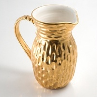 Precious metals and porcelain capture the timeless shifting of ocean, wind and sand into lasting impressions inspired by the dunes of Truro, Cape Cod. Precious metals and porcelain capture the timeless shifting of ocean, wind and sand into lasting impressions inspired by the dunes of Truro, Cape Cod.