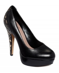Go for a basic that's bolder than the rest. Cutouts reveal metallic underlay on the heel of the extraordinary Mornings platform pumps by Vince Camuto. Go for a basic that's bolder than the rest. Cutouts reveal metallic underlay on the heel of the extraordinary Mornings platform pumps by Vince Camuto.