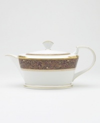 Add drama to your tabletop with this bold pattern from Noritake! Strikingly elegant, this bone china features a rich gold and red brocade border adorned with soft ivory dots and a gold band. Add drama to your tabletop with this bold pattern from Noritake! Strikingly elegant, this bone china features a rich gold and red brocade border adorned with soft ivory dots and a gold band.