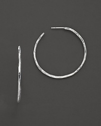 From the Silver collection, hammered hoop earrings in sterling silver. Designed by Ippolita. From the Silver collection, hammered hoop earrings in sterling silver. Designed by Ippolita.