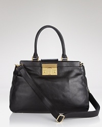 Tory Burch's roomy leather satchel is a city girl essential. With a convertible make, this color-pop bag is designed to adapt to whatever your day (or closet) throws at it. Tory Burch's roomy leather satchel is a city girl essential. With a convertible make, this color-pop bag is designed to adapt to whatever your day (or closet) throws at it.