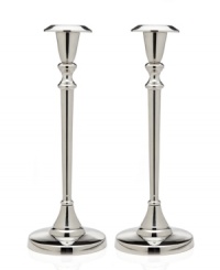 Cast your home in a more beautiful light with Godinger candlesticks. A classic tulip shape defines a polished aluminum pair to accentuate any setting. Cast your home in a more beautiful light with Godinger candlesticks. A classic tulip shape defines a polished aluminum pair to accentuate any setting.