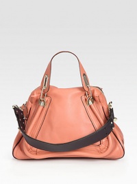 Luxurious calfskin leather with double top handles and goldtone hardware. Double top handles, 5 dropDetachable shoulder strap, 14 dropTop zip closureOne inside zip pocketFully lined15W X 10H X 6DMade in Italy Luxurious calfskin leather with double top handles and goldtone hardware. Double top handles, 5 dropDetachable shoulder strap, 14 dropTop zip closureOne inside zip pocketFully lined15W X 10H X 6DMade in Italy