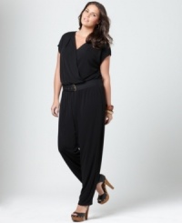 Jump-start your casual look in DKNYC's short sleeve plus size jumpsuit, cinched by a belted waist-- it's so on-trend! Jump-start your casual look in DKNYC's short sleeve plus size jumpsuit, cinched by a belted waist-- it's so on-trend!