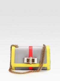 A chic colorblocked style in patent and smooth leather with a sweet bow detail, gold tone hardware and signature red lining.Chain shoulder strap, 12 dropPush-lock flap closureOne open pocket under flapOne inside zip pocketOne inside open pocketSignature red lining10W X 6¼H X 2¾DMade in Italy