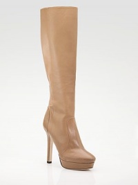 Butter-soft leather platform style enhanced with seaming details and a full back zipper.Self-covered heel, 4¾ (120mm) Covered platform, 1 (25mm) Compares to a 3¾ heel (95mm) Shaft, 15 Leg circumference, 14 Leather upper Full-length exposed back zipper Leather lining and sole Padded insole Made in ItalyOUR FIT MODEL RECOMMENDS ordering one half size up as this style runs small. Butter-soft leather platform style enhanced with seaming details and a full back zipper.Self-covered heel, 4¾ (120mm) Covered platform, 1 (25mm) Compares to a 3¾ heel (95mm) Shaft, 15 Leg circumference, 14 Leather upper Full-length exposed back zipper Leather lining and sole Padded insole Made in ItalyOUR FIT MODEL RECOMMENDS ordering one half size up as this style runs small.