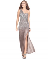 Xscape's gown glitters with a cascade of sequins on a one-shoulder silhouette.