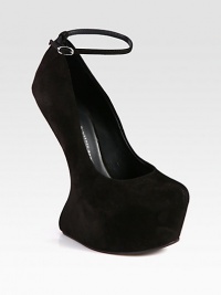 An adjustable ankle strap tops this fierce design with a curved-wedge and hidden platform. Self-covered wedge, 6½ (165mm)Hidden platform, 2 (50mm)Compares to a 4½ heel (115mm)Suede upperAdjustable ankle strapLeather liningLeather sole with a rubber insertPadded insoleMade in Italy An adjustable ankle strap tops this fierce design with a curved-wedge and hidden platform. Self-covered wedge, 6½ (165mm)Hidden platform, 2 (50mm)Compares to a 4½ heel (115mm)Suede upperAdjustable ankle strapLeather liningLeather sole with a rubber insertPadded insoleMade in Italy